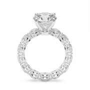 White Stone Round Shape Diamond Eternity Engagement Ring With Shared Prong Setting.